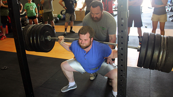 Squat: bilanciere alto contro bilanciere basso